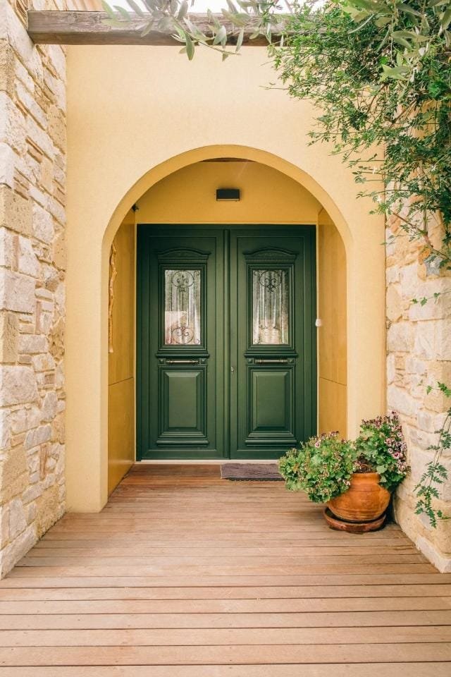 Green arched entrance door