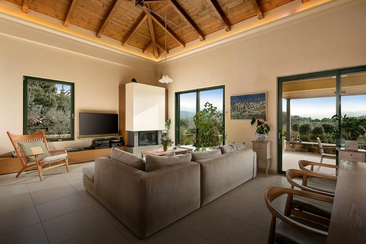 Vaulted living room at Ariti Villa in Galatás